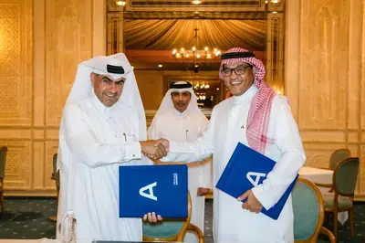 ARABSAT and Es'hailSat executives signing strategic partnership agreement at Arab Radio and Television Festival in Tunisia